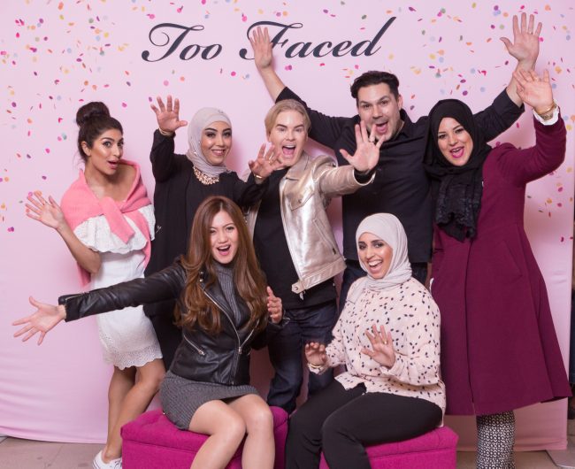 Fun Group in front of step and repeat at Too Faced annual meeting