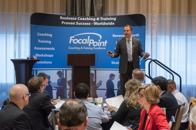 Speaker addressing meeting closeup