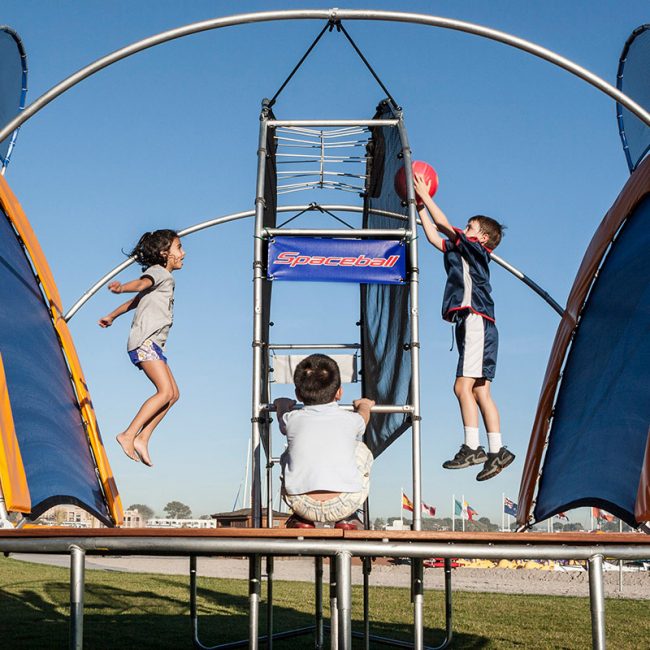 Kids Playing Spaceball Mission Beach